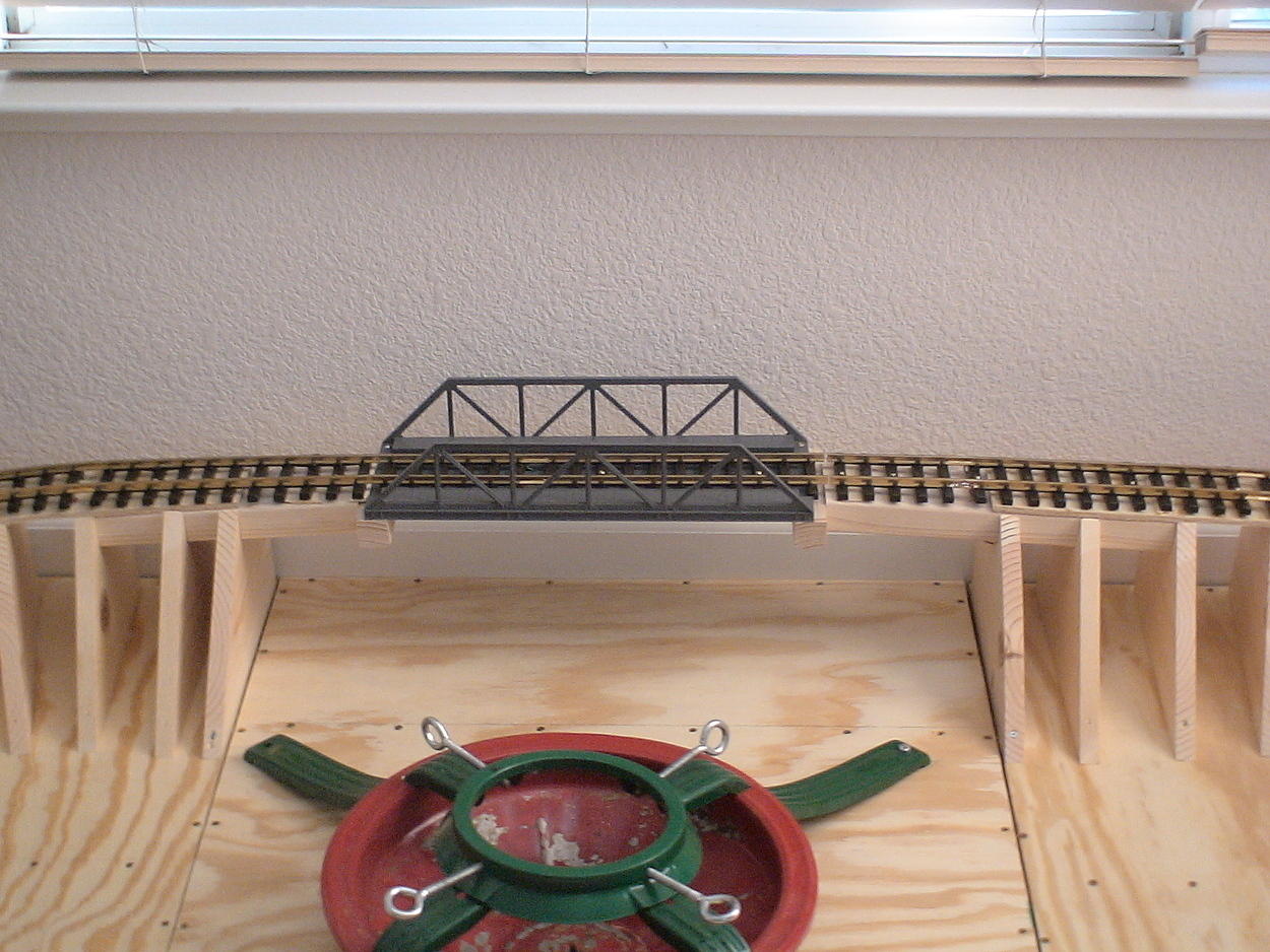 Shows bridge section in relation to tree stand