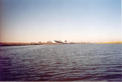 There is a fertilizer plant a couple miles up stream from the port