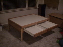 Finished table with drawers open